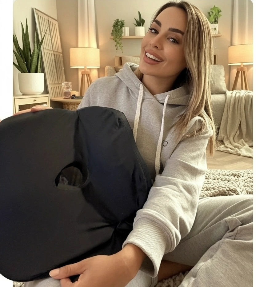 Woman holding a black posture cushion(seat cushion) Soothe in a cozy living room.